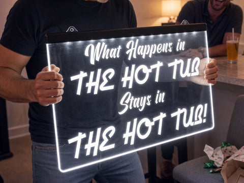 Image of What Happens in the Hot Tub Illuminated Sign