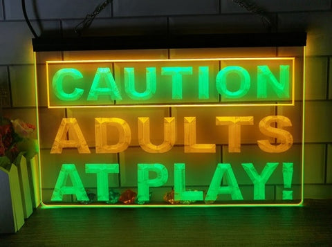 Image of Caution Adults At Play Two Tone Illuminated Sign