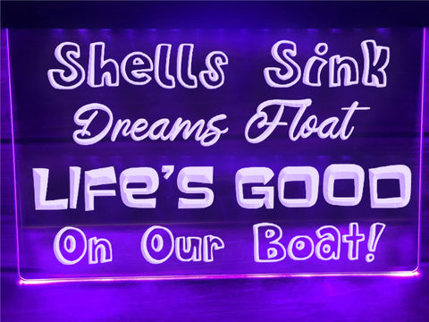 Image of Shells Sink, Dreams Float Illuminated Sign