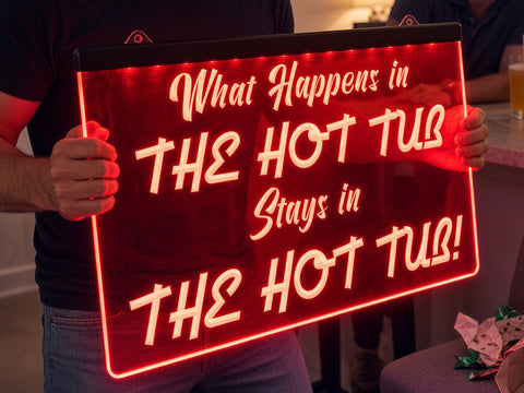 Image of What Happens in the Hot Tub Illuminated Sign
