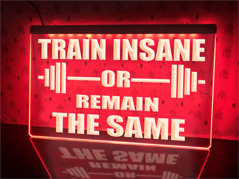 Image of Train Insane Illuminated Sign