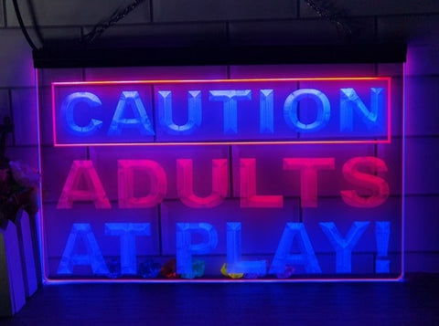 Image of Caution Adults At Play Two Tone Illuminated Sign