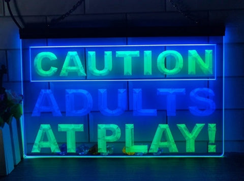 Image of Caution Adults At Play Two Tone Illuminated Sign